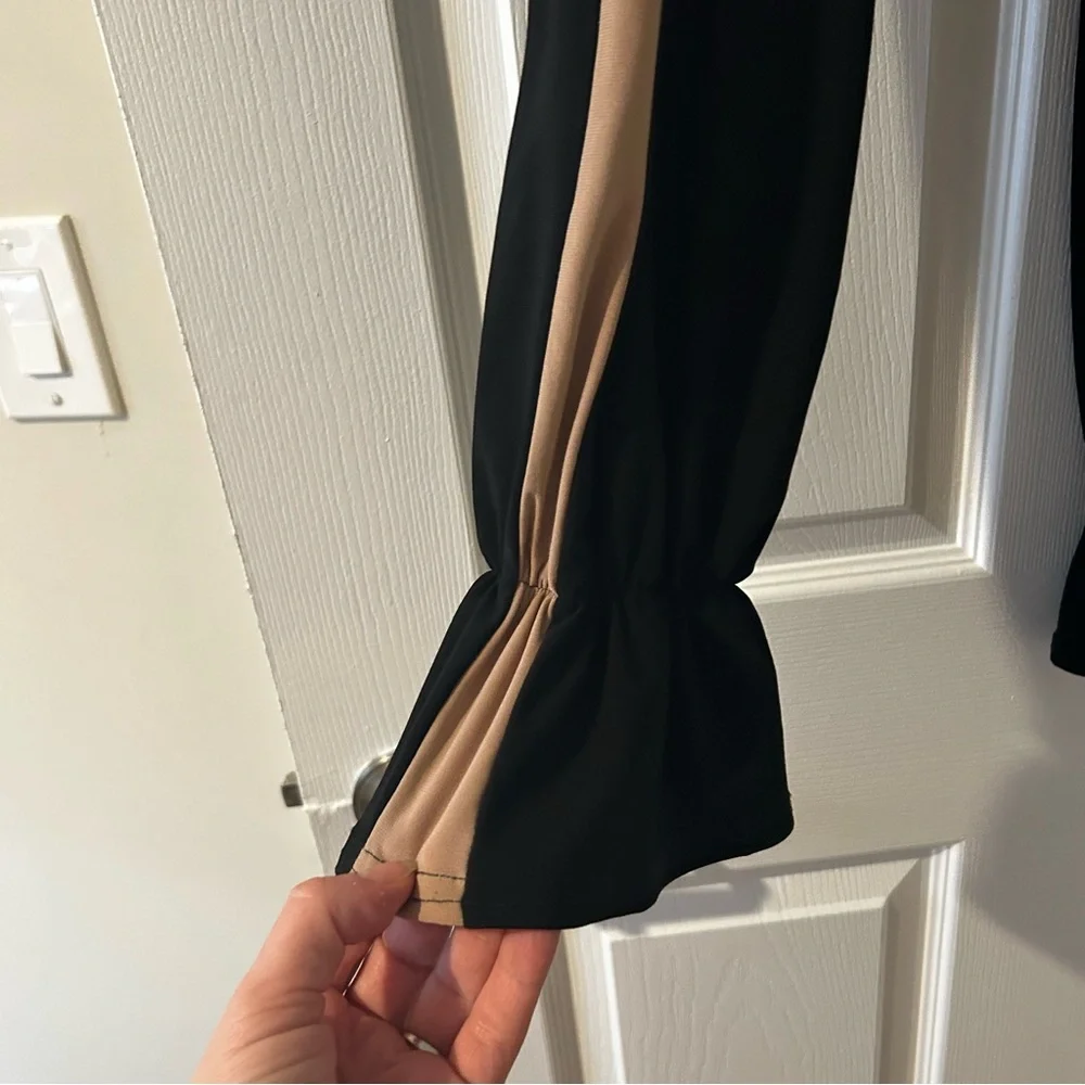 Talisman Ballroom Latin Practice girls black with tan sides pants. Size 142 cm.